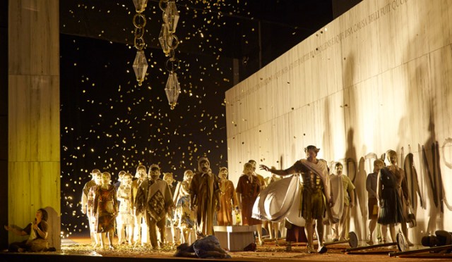 Michael Schade as Tito (standing), and the chorus in the Canadian Opera Company’s production of La clemenza di Tito, 2013. director Christopher Alden (Photo: Michael Cooper)