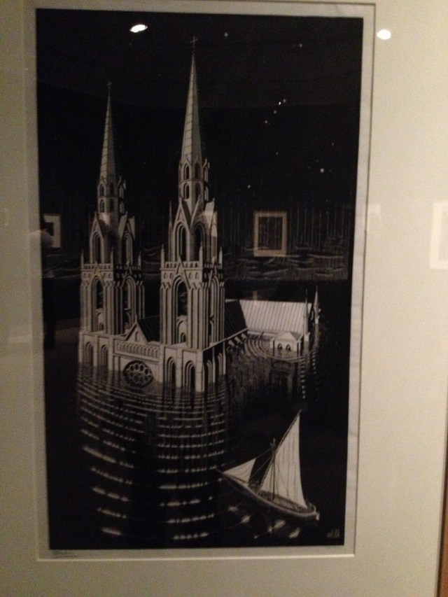 M.C. Escher: The Drowned Cathedral, January 1929 woodcut on laid japan paper, 79.2 x 48.3 cm;  image: 72 x 41.6 cm Gift of George Escher, Mahone Bay, Nova Scotia, 1985 National Gallery of Canada, Ottawa M.C. Escher’s “The Drowned Cathedral” © 2014 The M.C. Escher Company-The Netherlands. All rights reserved. www.mcescher.com 